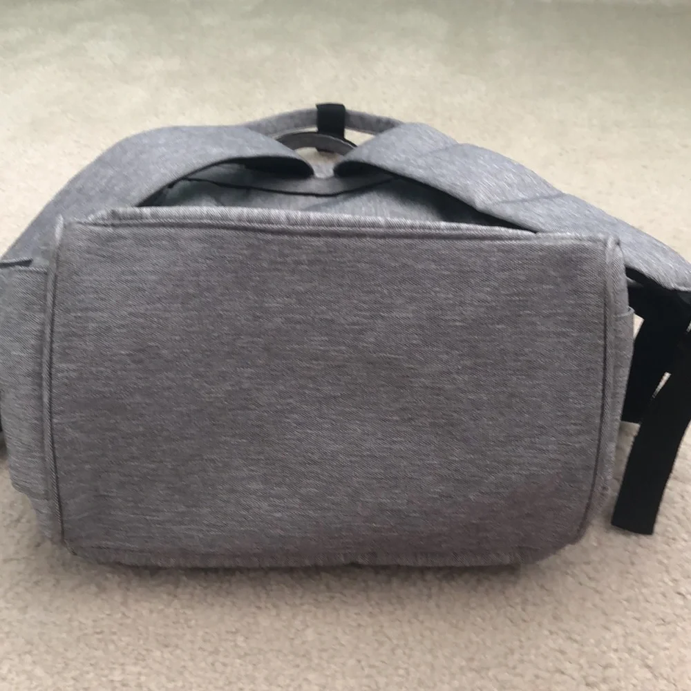 Baby changing gray backpack with multiple pockets